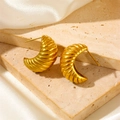 Macro detail of gold plated stainless steel croissant earrings on a natural stone base - Croissant Thread Stud Earrings Gold (F516)