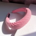 Pink knit wide-brimmed headband with V-shaped texture and handmade label tag - Korean Pink