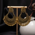 Detailed shot of retro gold bohemian earrings with floral carving and bead tassels - H4416-1 Antique Gold