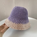 Close-up of the handcrafted purple and beige woven texture on a summer straw bucket hat - M (56-58cm) / Purple