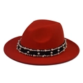 Detail of red wool felt fedora featuring a black band with elegant white pearl accents - Bright Red Fedora with Pearl Chain