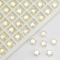 Macro shot of 8mm iridescent star-shaped glass beads for DIY jewelry making - Crystal Yellow