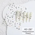 Detail of floral nail art stickers MO-287 with white and yellow flowers on nail tips - MO-287/Black Branch White Flowers