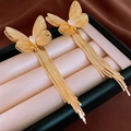 Detail of gold butterfly tassel earrings with cubic zirconia and shimmering metal chains - Butterfly Zircon Tassel (39#)