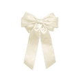 Detail showing the layered satin texture and creamy white finish of the large bow hair clip - Off White