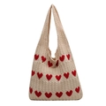 Beige knitted shoulder bag with red heart patterns and crochet texture - Off White