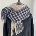 Beige and dark blue houndstooth scarf with tassels on a model for winter warmth - Two-tone Houndstooth (Navy)