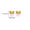 Detail view of 18K gold bow-shaped pearl earrings with 14mm height and 12mm width measurements - Grid Bowknot Pearl
