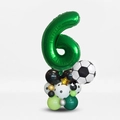 Detail of football theme balloon set with large green number six and shiny gold star - Number 6