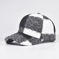 Close-up of black and white checkered baseball cap showing warm fuzzy wool texture - Adjustable / Patchwork Black White
