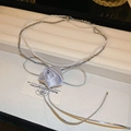 Detail of double-layer necklace with lavender silk rose and delicate pearl strand - Grey Flower Bow Necklace
