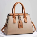 Elegant beige lychee texture leather handbag with stylish brown handles and crossbody strap - 28x14x20cm / Off White