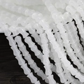 Detailed view of translucent white bamboo-shaped glass beads for DIY jewelry making - 7x10mm Vase Shape White (1Pc)
