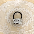 Close-up of a silver hammered metal cuff hair tie on elegant lace background - Silver Double Bar Liquid Metal