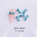 Blue heart rhinestone bow nail charm on pink false nail, size 9.5x4mm - Blue Silver Base Bow (8068)