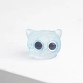 Blue translucent crystal resin cat figurine with black eyes on a white background - Aquamarine