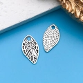 Silver alloy leaf charms with detailed vein and dot patterns for DIY jewelry making - Single-sided Leaf 8x16mm