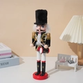 Close-up of wooden Christmas nutcracker soldier drummer on a cozy decorative bookshelf - 30CM Cloth Wrapped Drummer Nutcracker