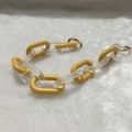 Close-up of yellow and frosted white acrylic chunky chain with gold metal spring rings - 37cm / Frosted Ginger Yellow