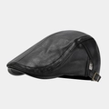 Detail of vintage black PU leather ivy cap featuring lychee texture and bronze metal buckle - Adjustable / Black