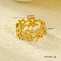 Detailed view of 18K gold leaf cutout ring on stone background with size dimensions - Leaf Vine Hollow