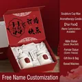Red engagement gift box with white ceramic goddess candles in bluebell and freesia scents - Bluebell + Freesia Engagement Edition