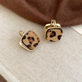 Close-up of square gold earrings with leopard print plush texture on linen background - 39# Square Gold Border Plush Leopard Ear Buckles (Gold-Deep Coffee)