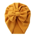 Mustard yellow baby turban hat with waffle texture and a large bow decoration - Turmeric