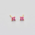Detailed macro shot of small gold earrings with four pink-purple zirconia flower petals - Gold Color Rose Red Zirconia