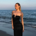 Elegant black strapless maxi dress with waist ruching and metal buckle on beach sunset - S / Black