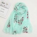 Light green chiffon scarf featuring delicate red flower embroidery on white background - Aqua Blue