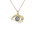 Golden evil eye necklace with blue and clear pavé zircon stones on white background - Blue White Zircon Evil Eye