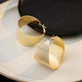 Macro detail of gold-plated hoop earrings featuring a thick textured striped pattern - 39# Steel Pin-Gold-Geometric