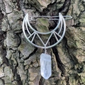 Silver hollow moon hair clip with a clear quartz crystal pendant on wood background - Clear Iridescent Crystal