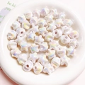 Iridescent white star and round beads displayed in a ceramic bowl for DIY jewelry making - 16mm (Hole approx 2.5mm) / White