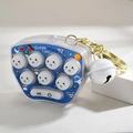 Dettaglio mini console gioco portatile con guscio blu e campanellino bianco su portachiavi - Fibbia in Oro Chiaro + Campanello Macchina Talpa / Bianco Trasparente