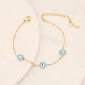 Detail of gold flower bracelet with blue evil eye petals and adjustable lobster clasp - Blue