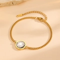 Elegant 18K gold-plated stainless steel chain bracelet featuring a round cut crystal stone - Gold Round White Zirconia (E413)