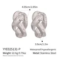 Detailed view of large stainless steel twisted earrings showing product dimensions and weight - Silver (YYE025131-P)