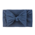 Close-up of navy blue baby headband with a soft nylon bow and wide elastic texture - Navy Blue