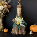 Close-up of decorative branch broom with dried flowers, pine cones and pearls detail - Broom+Flowers+Natural Pearl