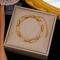 Polished gold stainless steel thick oval link bracelet in a jewelry box setting - Gold Stainless Steel Rectangle Chain Bracelet (SLE2076)