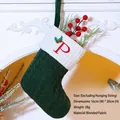 Green knit Christmas stocking with white cuff and red embroidered letter P pattern - Letter P / Dark Green