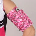 Elastic sports arm band in pink camouflage pattern holding a white smartphone - Pink Camouflage
