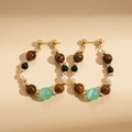 Detail of beaded hoop earrings with tiger eye, pearls, and gold accents on paper - Round Hoop Style (Silver Needle - Coffee) / 925 Silver