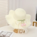 Straw sun hat in beige with delicate lace trim and pink tulip bow detail - Single Flower Creamy White