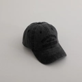 Close-up of embroidered vintage lettering on a washed dark gray cotton baseball cap - 54cm (3-8 Years) / Black