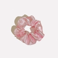 Macro detail of pink satin scrunchie fabric showing smooth texture and elegant pleats - Satin 7 (Pink)