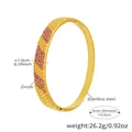 Detail of gold stainless steel bracelet with pink zircon and embossed grain texture - Z398-Clasp Style / Gold Pink Zirconia
