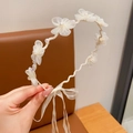 Elegant white lace floral headband with pearls and flowing ribbons for girls - Flowers on Branches